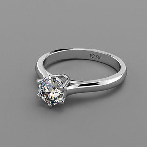 Anillo solitario en Oro 750 y diamantes